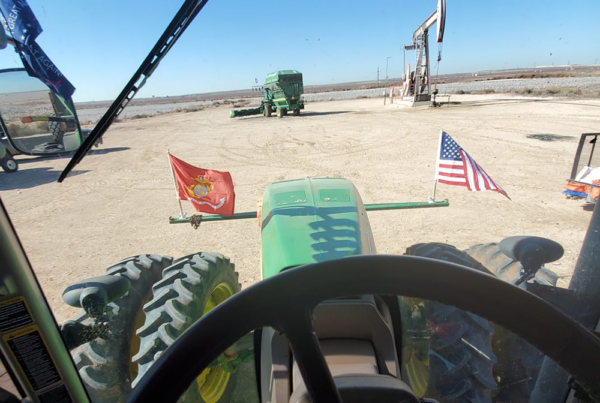 Patriotic Flag and Veteran's Flag on Tractor in Texas
